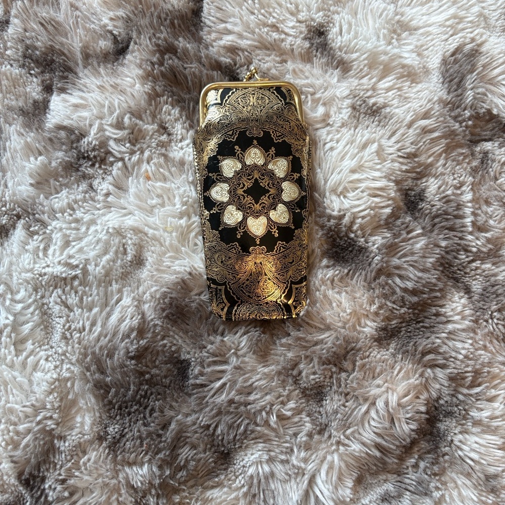 Sold! 
Elegant Black and Gold Cigarette Case